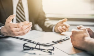 new york workplace accident lawyer talking to a client