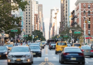 New York City busy street scene with cars and people